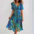 Flowy Printed Midi Dress with V-Neck and Asymmetrical Hem for Women
